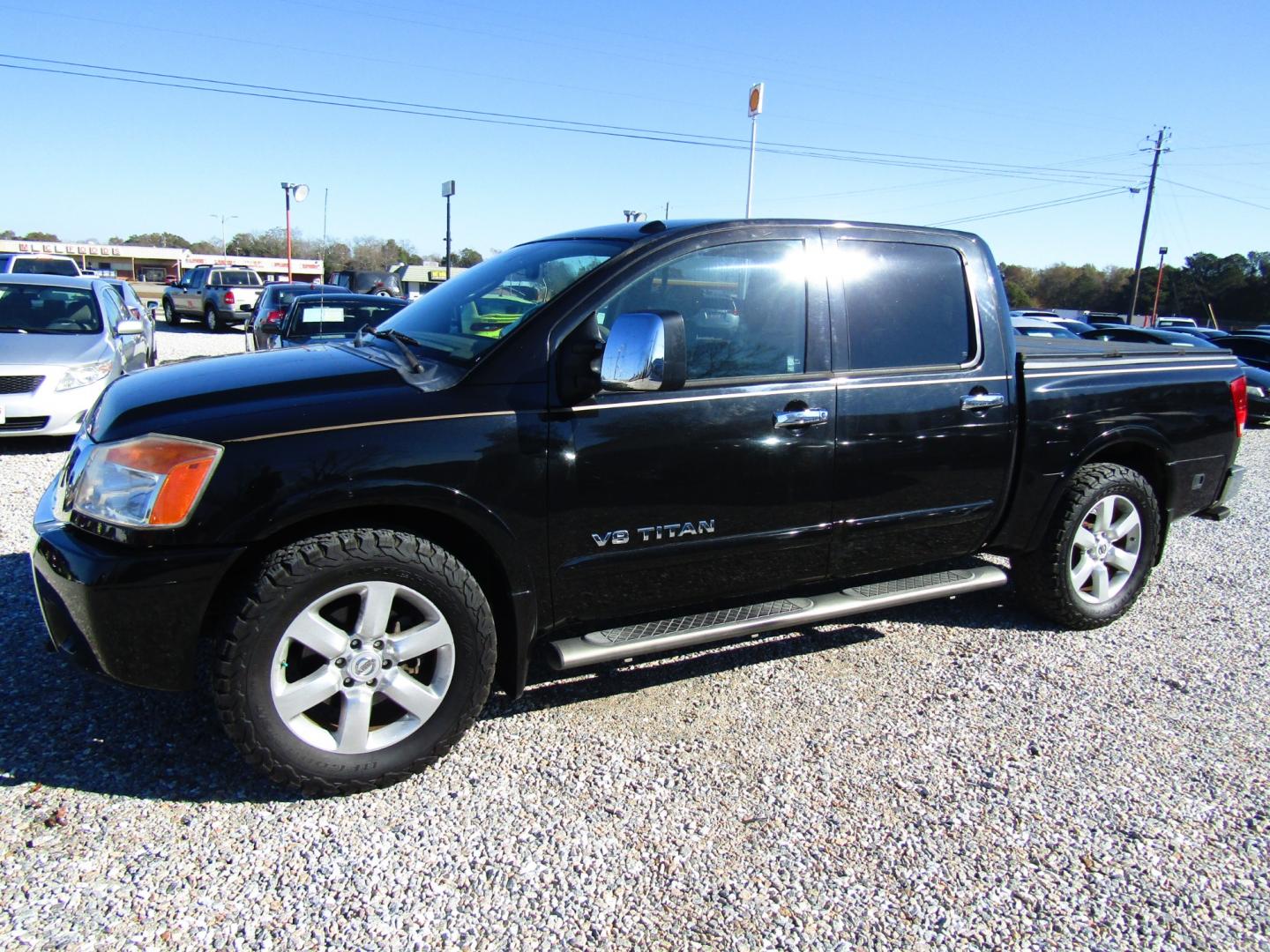 2011 Black /Tan Nissan Titan (1N6BA0ED1BN) , Automatic transmission, located at 15016 S Hwy 231, Midland City, AL, 36350, (334) 983-3001, 31.306210, -85.495277 - Photo#2